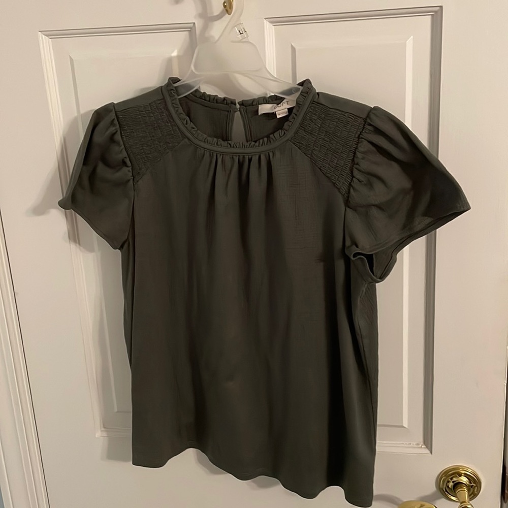 High neck, loft blouse, used, good condition, size 14, yet runs small